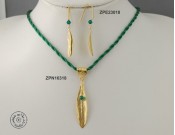 Gold plated cloth necklace with Swarovski inside big olive leaf & rolled olive leaf hook (Emerald color)